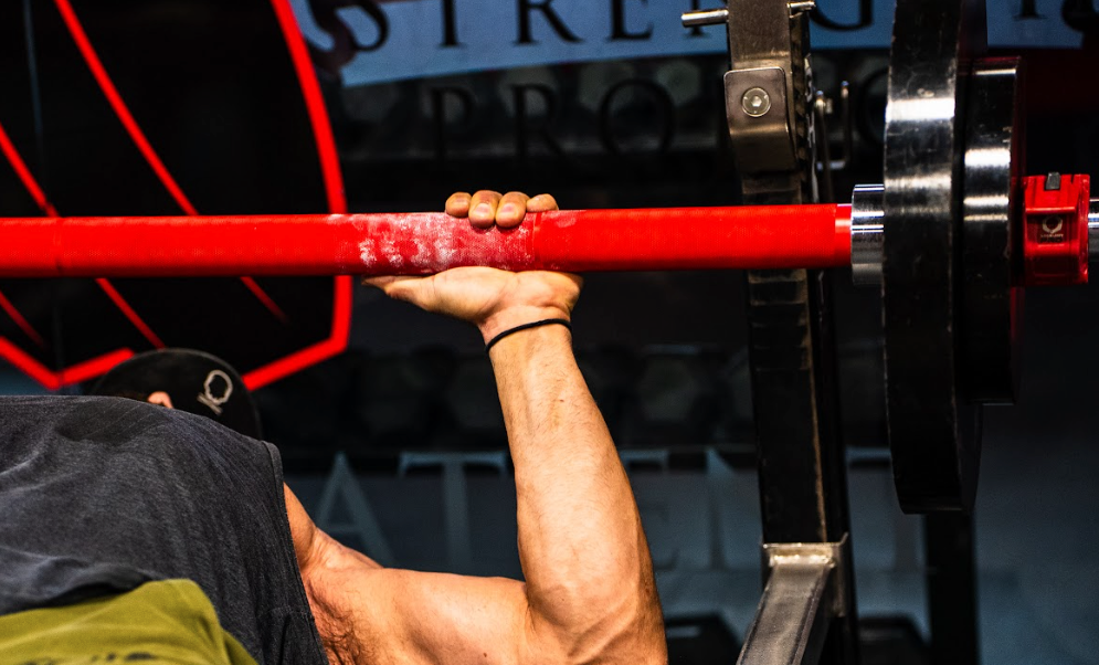 Top 5 Benefits of Training With a 2-Inch Fat Axle Bar